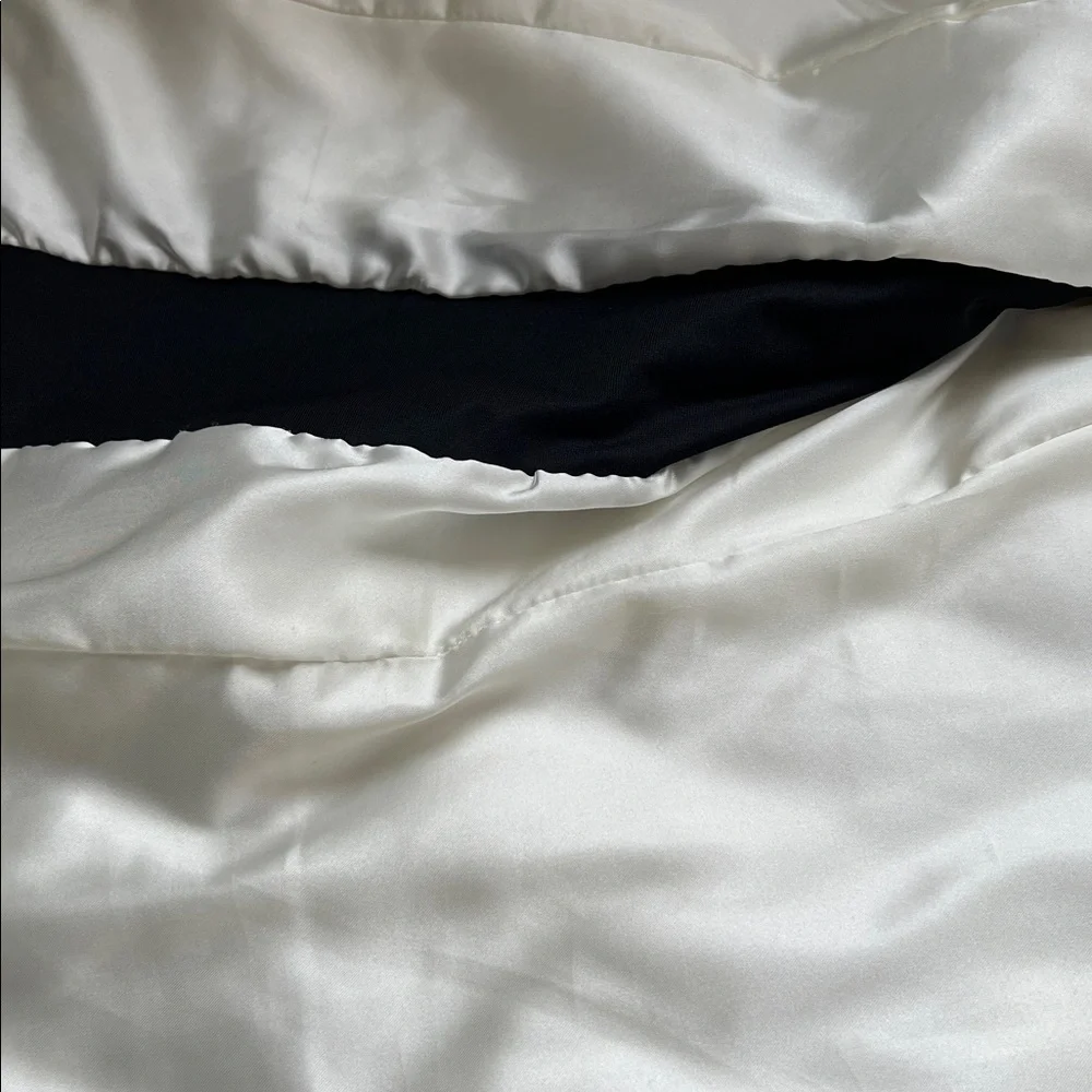 Cream and black quilted fitted vest by Calvin Klein with ribbed knit details sm - Picture 7 of 11